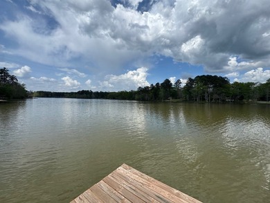 Set on nearly 100 acres of beautiful Golden Pond with easy - photo 4