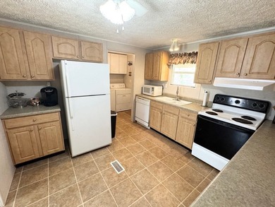 Set on nearly 100 acres of beautiful Golden Pond with easy - photo 7