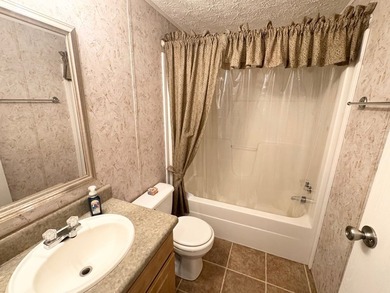 Set on nearly 100 acres of beautiful Golden Pond with easy - photo 10