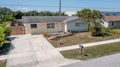 Welcome to this charming 4-bedroom, 2-bath home located in the - photo 2