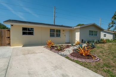 Welcome to this charming 4-bedroom, 2-bath home located in the - photo 3