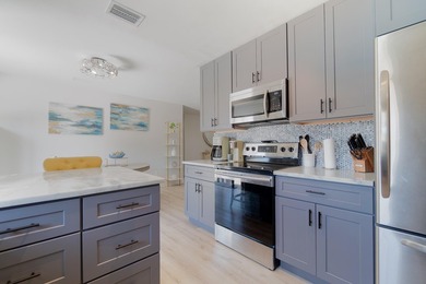 Welcome to this charming 4-bedroom, 2-bath home located in the - photo 6
