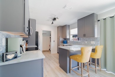 Welcome to this charming 4-bedroom, 2-bath home located in the - photo 7
