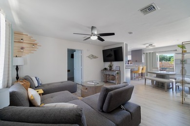 Welcome to this charming 4-bedroom, 2-bath home located in the - photo 9