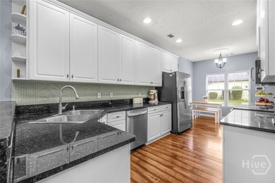 Welcome to life in The Village at Wild Heron, where tree-lined - photo 10