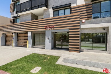 Stunning newer contemporary condo right across the street from - photo 2