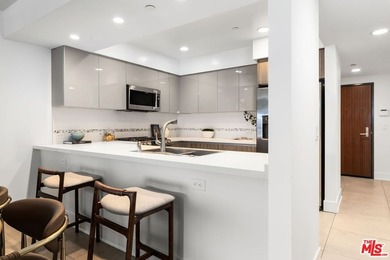Stunning newer contemporary condo right across the street from - photo 4