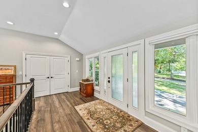 Fully renovated in 2022, this luxurious 4BR, 4.5BA lakefront - photo 5