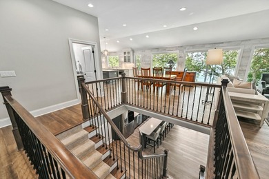 Fully renovated in 2022, this luxurious 4BR, 4.5BA lakefront - photo 6