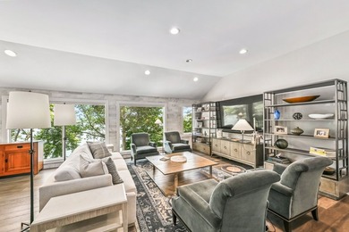 Fully renovated in 2022, this luxurious 4BR, 4.5BA lakefront - photo 8