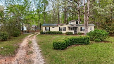 Check out this Lake Sinclair home overlooking peaceful water - photo 4