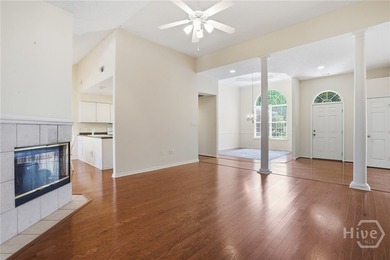 Enjoy peaceful pond views and classic Savannah charm in this - photo 3