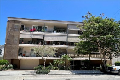 Welcome to this beautifully remodeled condominium in the highly - photo 2