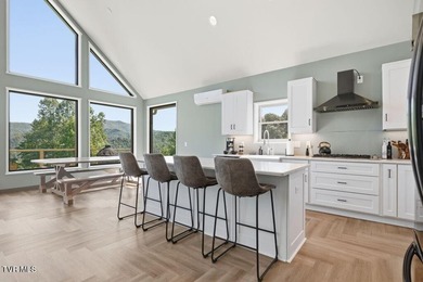 Perched above the crystal-clear waters of Watauga Lake, this - photo 13