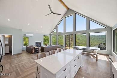 Perched above the crystal-clear waters of Watauga Lake, this - photo 14