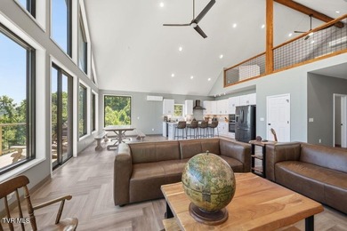 Perched above the crystal-clear waters of Watauga Lake, this - photo 18