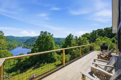 Perched above the crystal-clear waters of Watauga Lake, this - photo 20