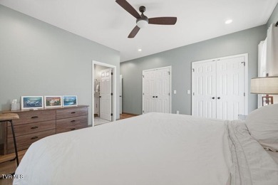 Perched above the crystal-clear waters of Watauga Lake, this - photo 26