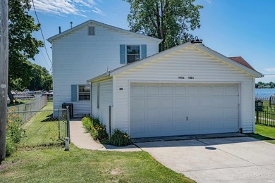 Experience lake living at its best! This adorable cottage on - photo 12