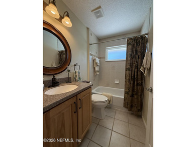 Set in a quiet, established neighborhood, this all-brick 4BR/3BA - photo 12