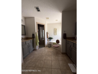 Set in a quiet, established neighborhood, this all-brick 4BR/3BA - photo 15