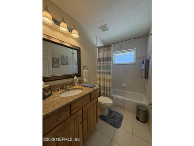 Set in a quiet, established neighborhood, this all-brick 4BR/3BA - photo 17