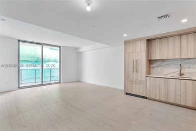 Wake up above the city with sweeping Biscayne Bay views from - photo 3
