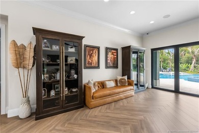 Behind a private electronic gate in prestigious Palm City Farms - photo 11