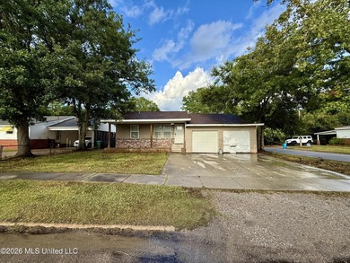 Welcome to Eastlawn! This updated 3-bedroom, 2-bath home sits on - photo 1