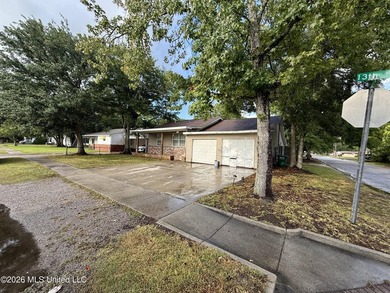 Welcome to Eastlawn! This updated 3-bedroom, 2-bath home sits on - photo 2