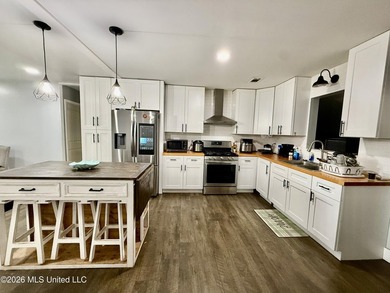 Welcome to Eastlawn! This updated 3-bedroom, 2-bath home sits on - photo 6