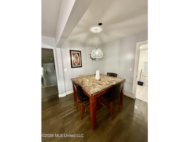 Welcome to Eastlawn! This updated 3-bedroom, 2-bath home sits on - photo 7
