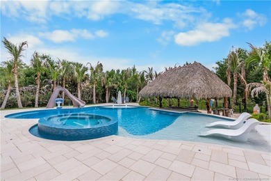 Behind a private electronic gate in prestigious Palm City Farms - photo 34