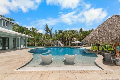 Behind a private electronic gate in prestigious Palm City Farms - photo 37
