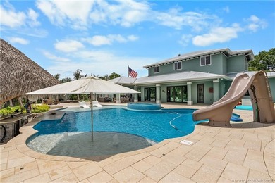 Behind a private electronic gate in prestigious Palm City Farms - photo 38