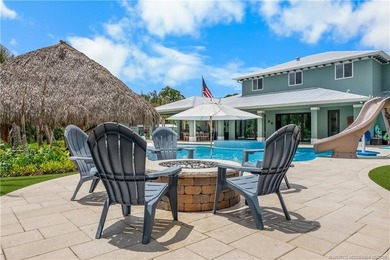 Behind a private electronic gate in prestigious Palm City Farms - photo 39