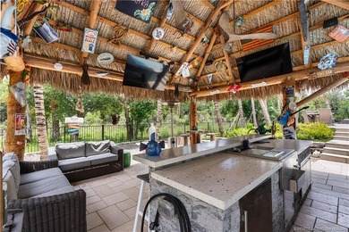 Behind a private electronic gate in prestigious Palm City Farms - photo 41