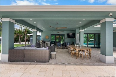Behind a private electronic gate in prestigious Palm City Farms - photo 43