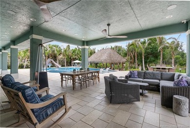 Behind a private electronic gate in prestigious Palm City Farms - photo 44