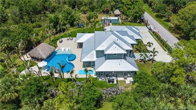 Behind a private electronic gate in prestigious Palm City Farms - photo 50