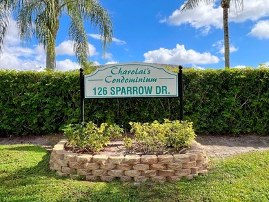 This updated first-floor condo is located in a well-established - photo 1