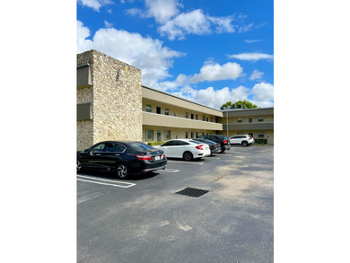This updated first-floor condo is located in a well-established - photo 2