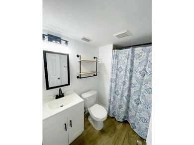 This updated first-floor condo is located in a well-established - photo 9