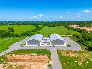 Positioned in the heart of Granbury, this exceptional commercial - photo 1