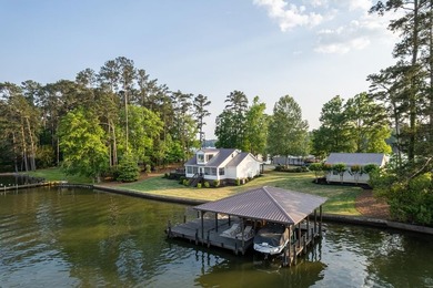 Completely reimagined and beautifully renovated, this Lake - photo 1