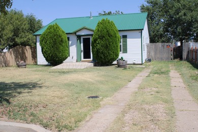 Freshly painted and move-in ready, this well-maintained home