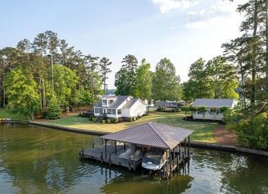 Completely reimagined and beautifully renovated, this Lake - photo 2