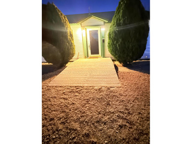 Freshly painted and move-in ready, this well-maintained home