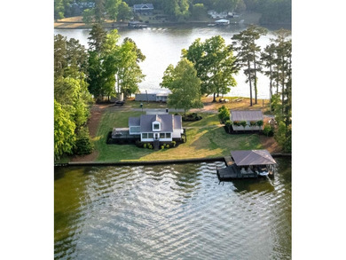 Completely reimagined and beautifully renovated, this Lake - photo 3