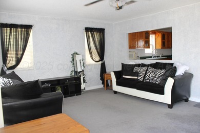 Freshly painted and move-in ready, this well-maintained home